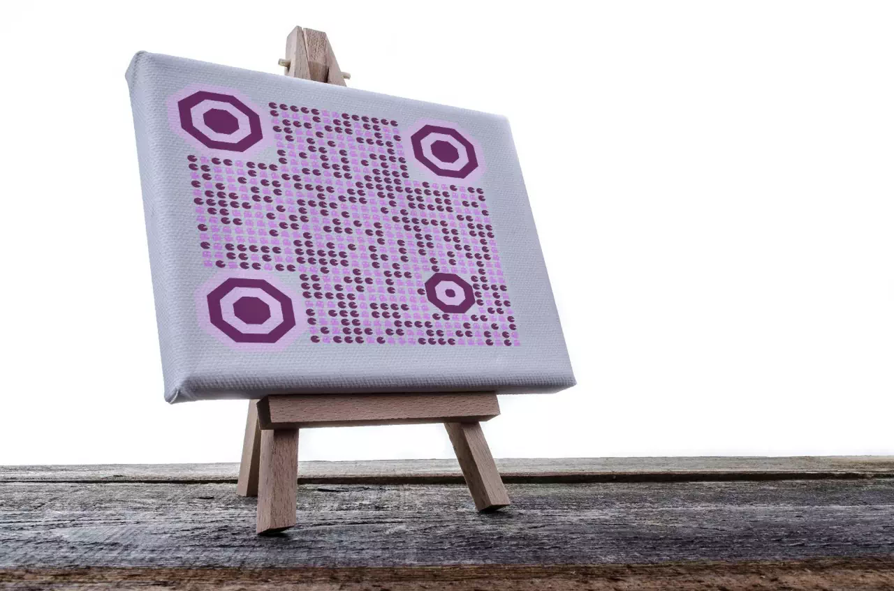 QRcodeLab qr generator - 3D QR image over a painting stand with Pacman and Blinky design elements
