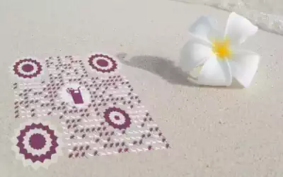 summer style qr code on beach sand with flower | universal qr code creator with logo